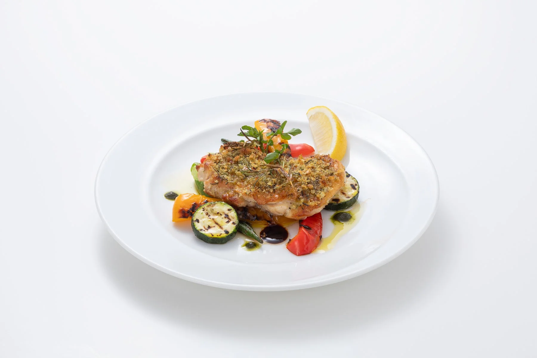 ひろしまハーブ鶏の香草パン粉焼き夏野菜のグリルを添えて